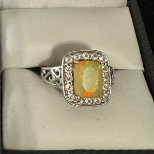 Cushion Ethiopian Opal W/White Round Topaz Rhodium over Silver. Sz 5.